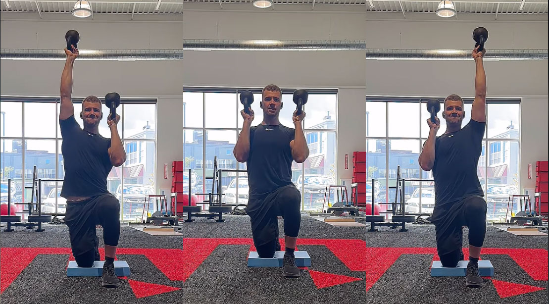 Dr. Justin Farnsworth, DPT showing how to an Kettlebell Bottoms-Up Alternating Press exercise