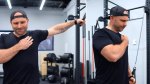 Fitness Coach Scott Bailey performing shoulder adductions to fix his nagging shoulder pain